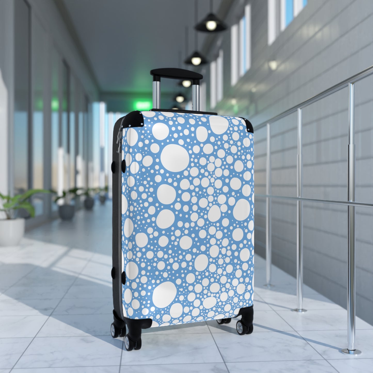 Blanca Ink Spots on Light Blue Suitcase