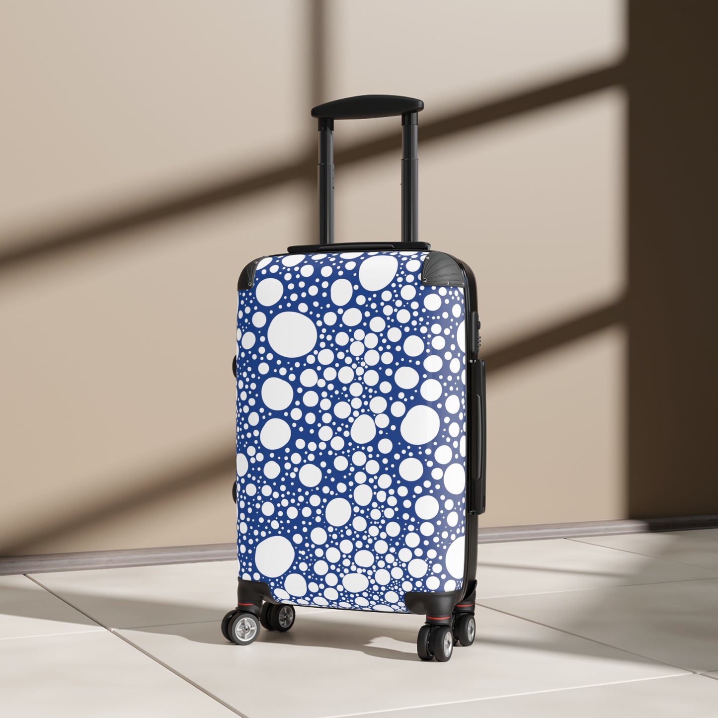 Blanca Ink Spots on Dark Blue Suitcase