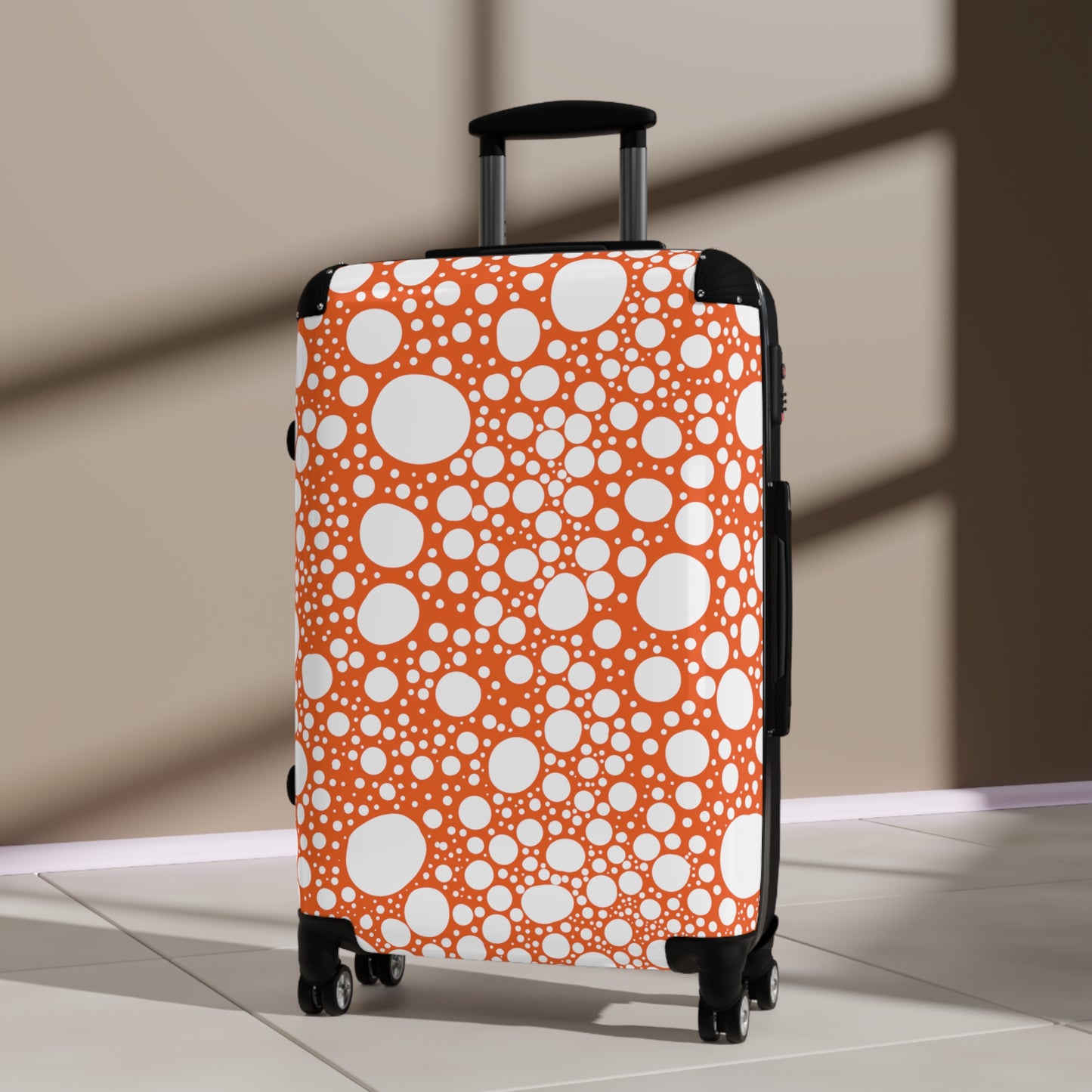 Blanca Ink Spots on Orange Suitcase