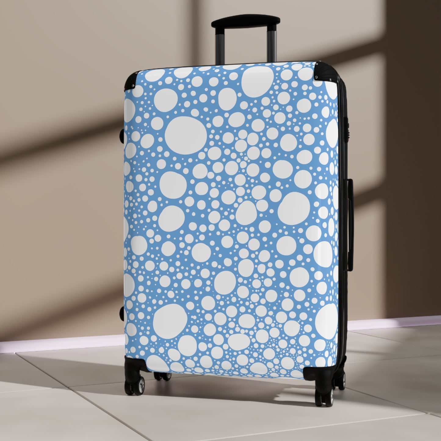 Blanca Ink Spots on Light Blue Suitcase