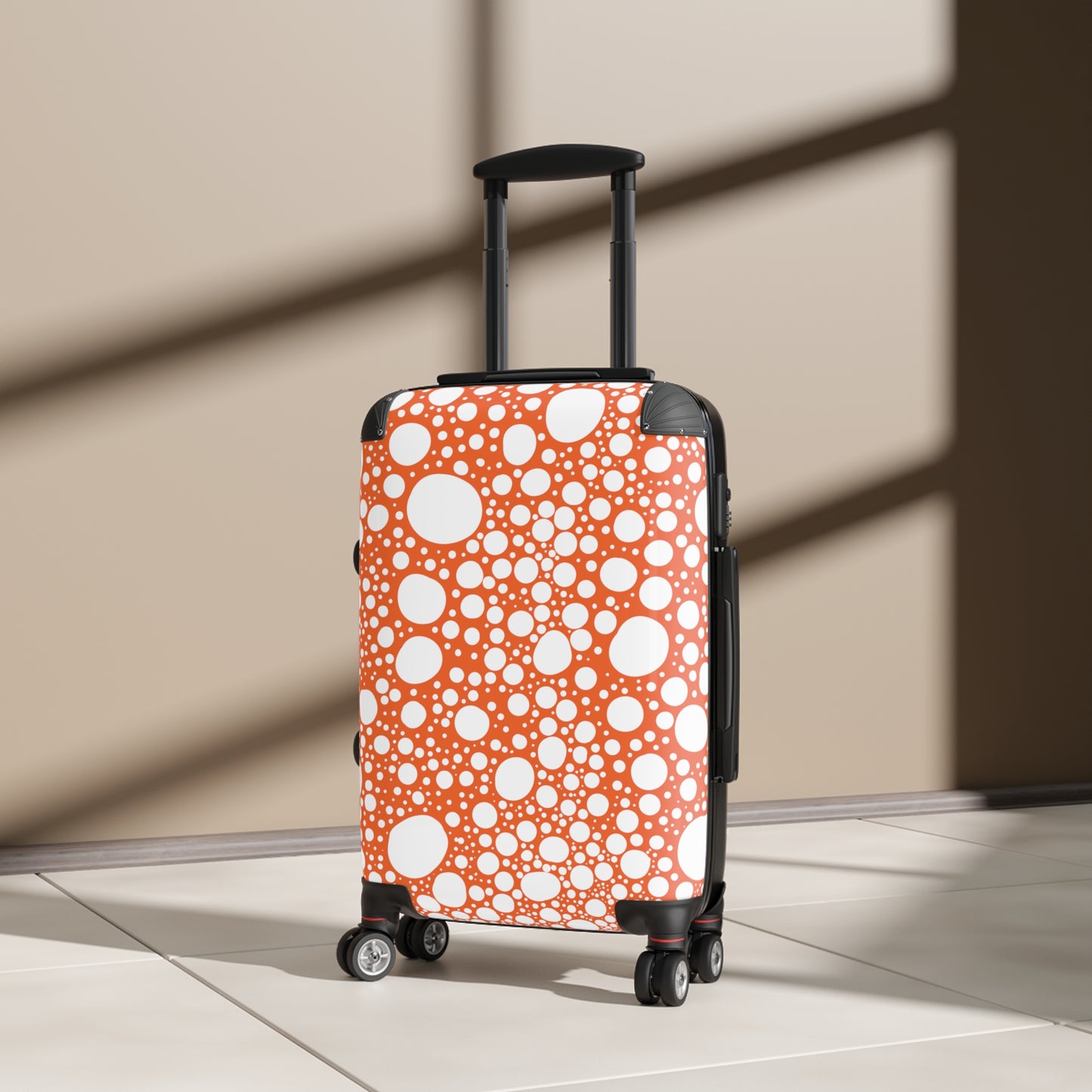 Blanca Ink Spots on Orange Suitcase