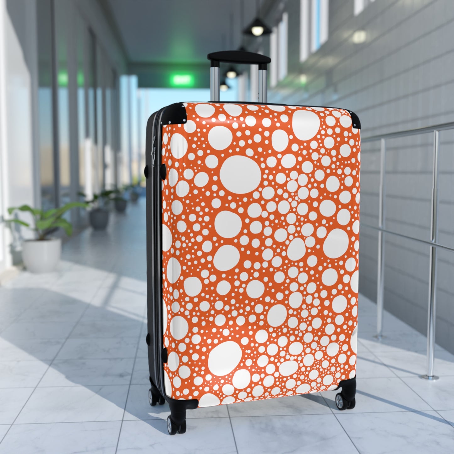 Blanca Ink Spots on Orange Suitcase