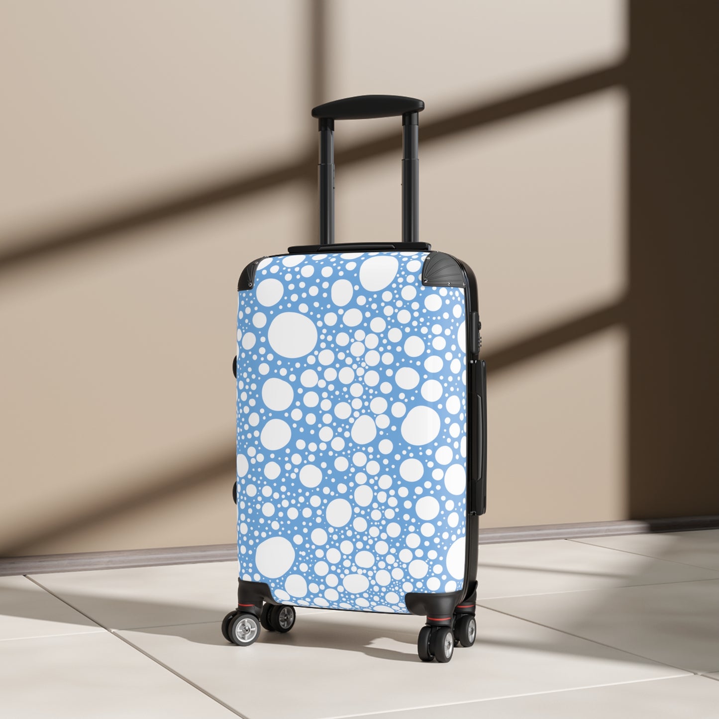 Blanca Ink Spots on Light Blue Suitcase