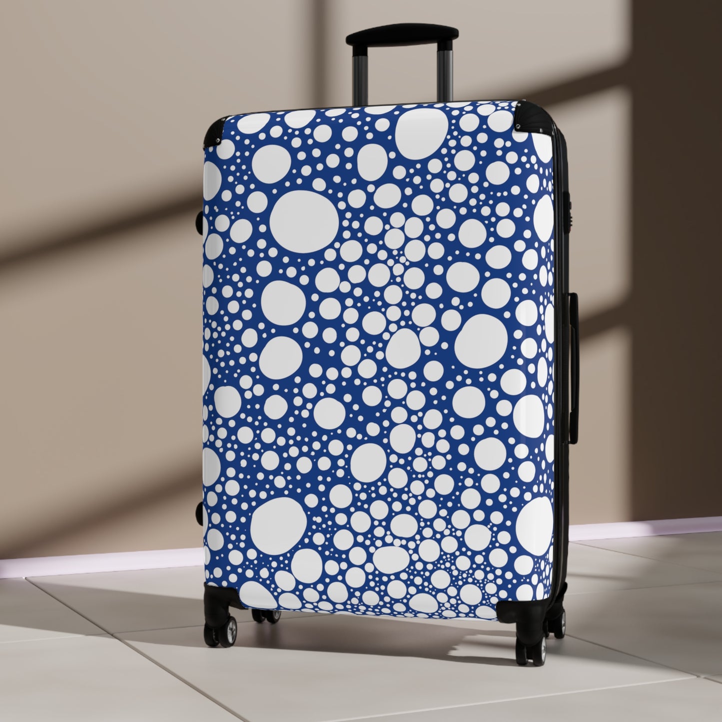 Blanca Ink Spots on Dark Blue Suitcase